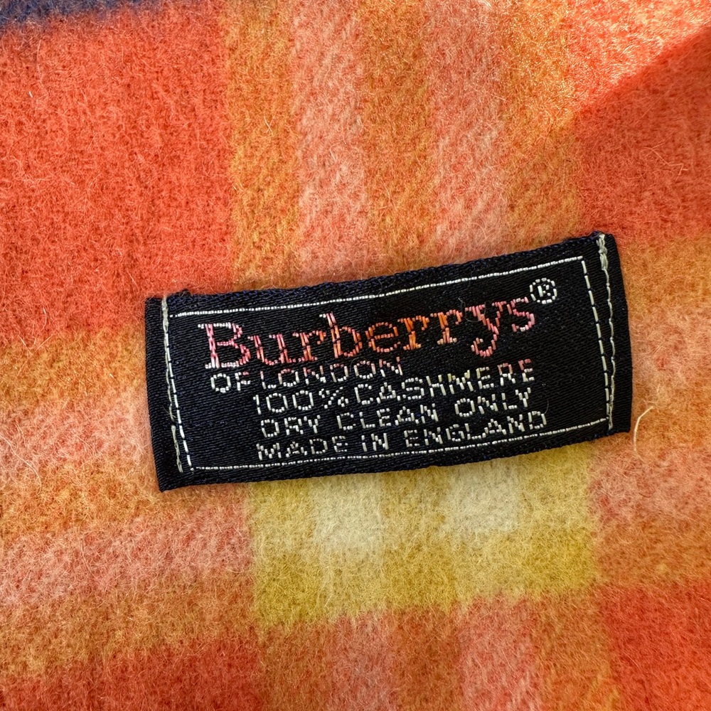 burberry cashmere scarf. orang with blue plaid